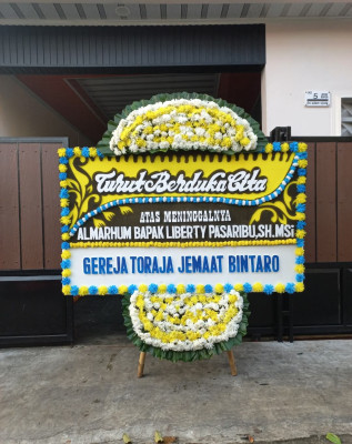 Papan Bunga Duka di Biawao